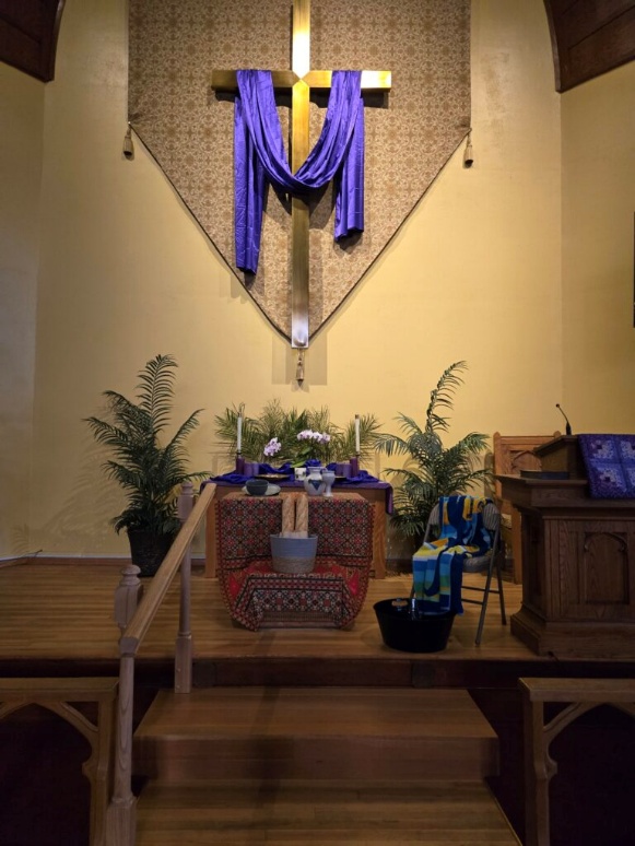 Cross and altar in the sanctuary