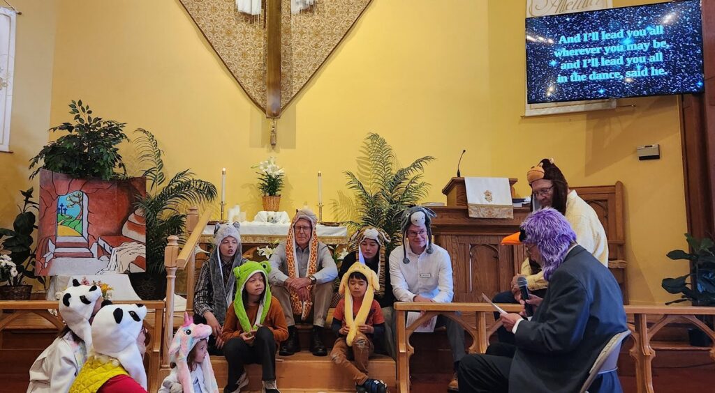 Children and adults taking part in an intergenerational church activity