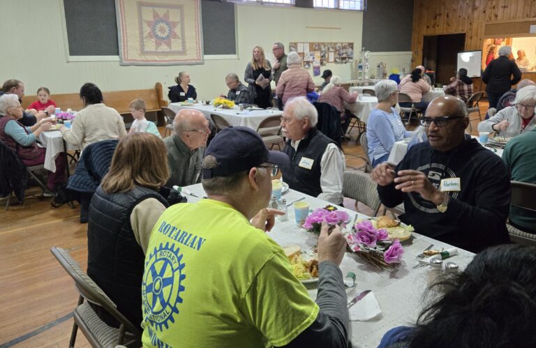 People gathered for a community meal